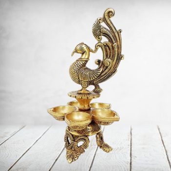 MohanJodero Brass Peacock Diya in Antique Golden finish