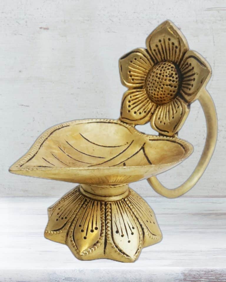 Brass Diya with Flower Handle Brass Diya with Flower Handle