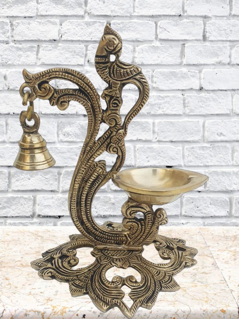 brass peacock diya with bell brass peacock diya with bell